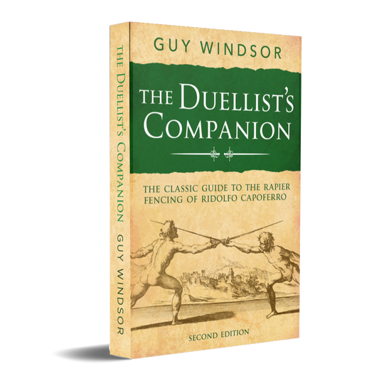 The front and spine of the book 'The Duellist's Companion' by Guy Windsor, Second Edition, shown on a clean white background. The cover features a textured beige background with a prominent dark green banner at the top containing the title in white serif text, and an illustration of two historical duellists below.